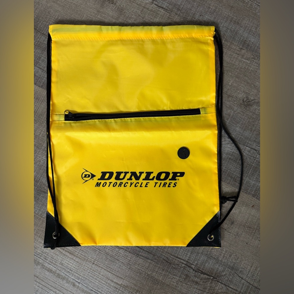 Yellow Drawstring daypack.  Dunlop motorcycle